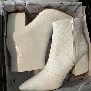 White pointed toe heel boot